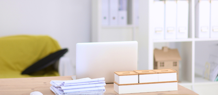 Modern office interior with tables, chairs and bookcases.の写真素材