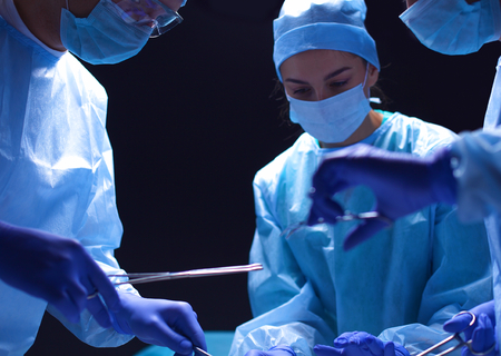 Team surgeon at work in operating roomの写真素材