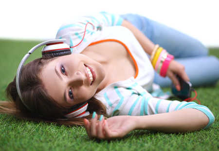 Young woman listening to the music .の写真素材
