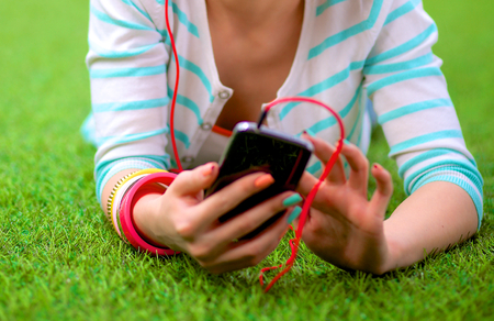 Young woman listening to the music .の写真素材