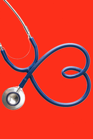 A stethoscope in the shape of a heart.の写真素材