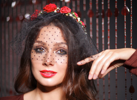 Retro portrait of a beautiful woman. Vintage style.