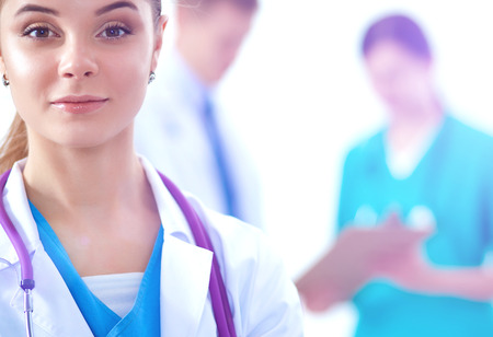 Attractive female doctor in front of medical group .の写真素材