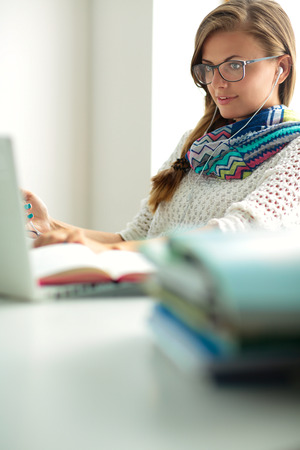 Woman use of mobile phone in universityの写真素材