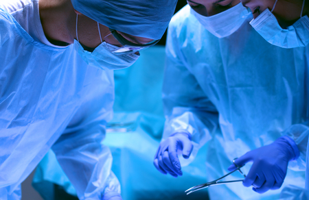 Team surgeon at work in operating room.の写真素材