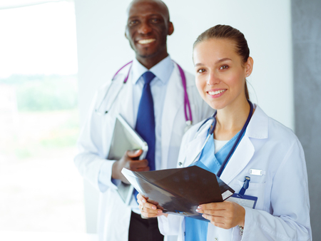 Doctors analyzing an x-ray in a metingの写真素材