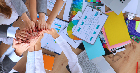 Business team with hands together - teamwork conceptsの写真素材