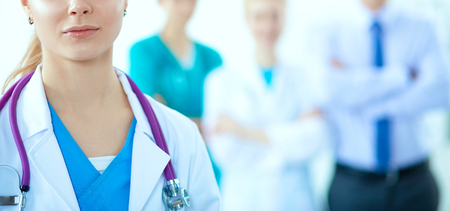 Attractive female doctor in front of medical group .の写真素材