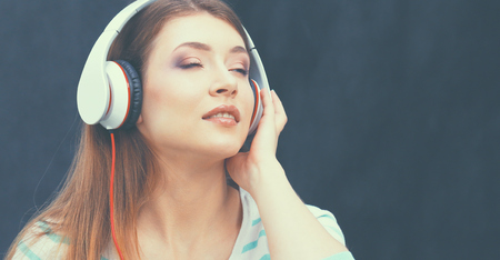 Young woman listening to the music .の写真素材