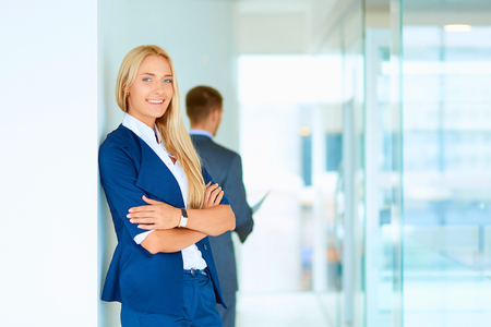 Businesswoman standing in a modern buildingの写真素材