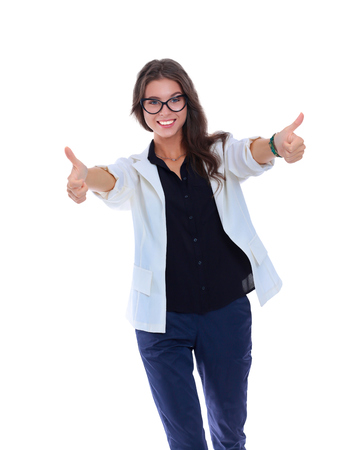 Beautiful business woman with her thumb up, showing oK.の写真素材