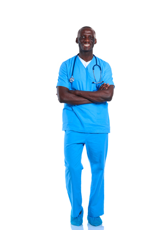 Portrait of a doctor man standing isolated on white backgroundの写真素材