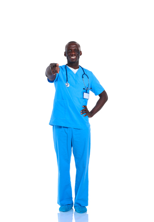 Portrait of a doctor man standing isolated on white backgroundの写真素材