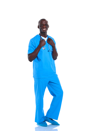 Portrait of a doctor man standing isolated on white backgroundの写真素材