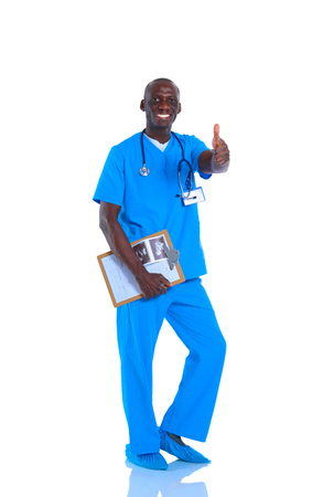 Portrait of handsome doctor holding a folder, showing Ok signの写真素材