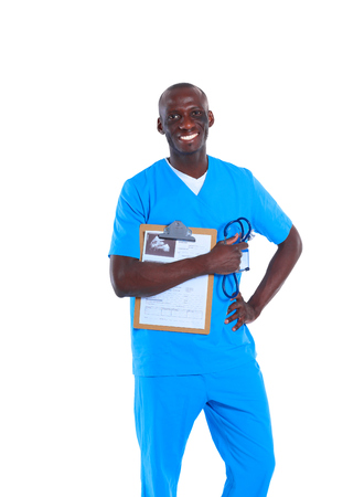 Male doctor standing with folder, isolated on white backgroundの写真素材