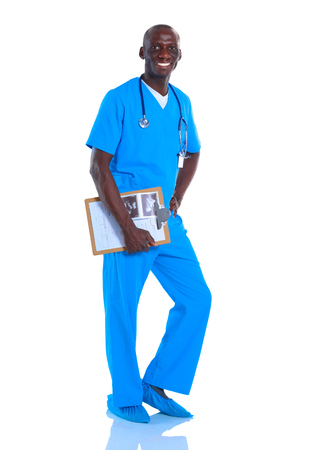Male doctor standing with folder, isolated on white backgroundの写真素材