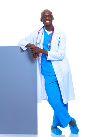 Male doctor holding empty placard.の写真素材