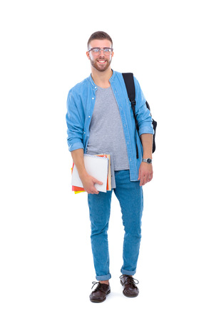 A male student with a school bag holding books isolated on white backgroundの写真素材