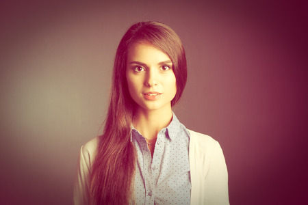 Portrait of a businesswoman , against dark backgroundの写真素材