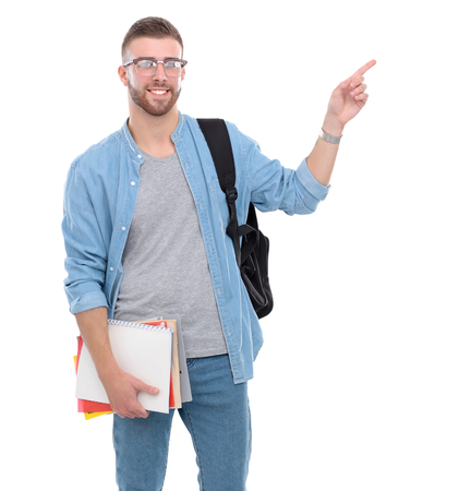A male student with a school bag holding books isolated on white background.の写真素材
