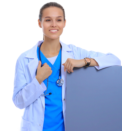 A female doctor with a blank billboard.の写真素材