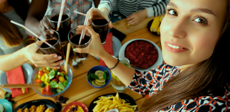 Group of people doing selfie during lunch.の写真素材