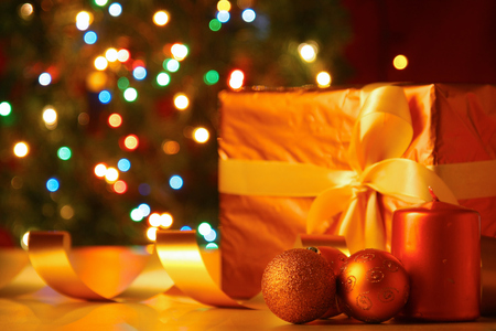 Gift boxes with balls on a christmas background.の写真素材