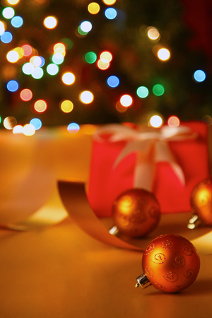 Gift boxes with balls on a christmas background.の写真素材