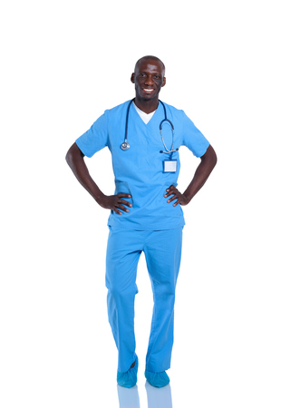 Portrait of a doctor man standing isolated on white background.の写真素材