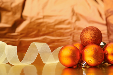 Gift boxes with balls on a christmas background.の写真素材