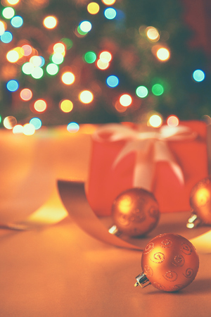 Gift boxes with balls on a christmas background.の写真素材