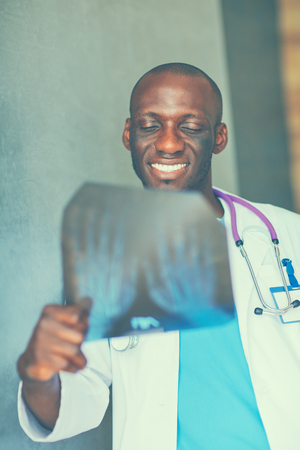 picture of male doctor looking at x-ray.の写真素材