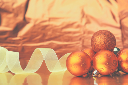 Gift boxes with balls on a christmas background.の写真素材