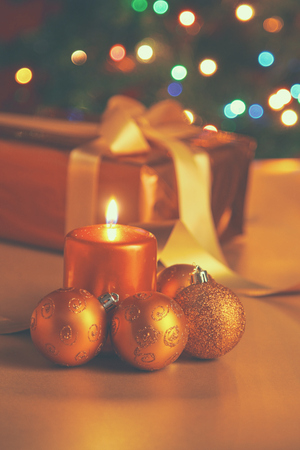 Gift boxes with balls on a christmas background.の写真素材