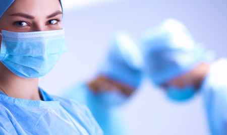Team surgeon at work in operating room.の写真素材