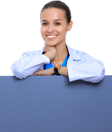 Female doctor with a blank billboard.の写真素材
