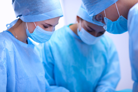 Team surgeon at work in operating room.の写真素材