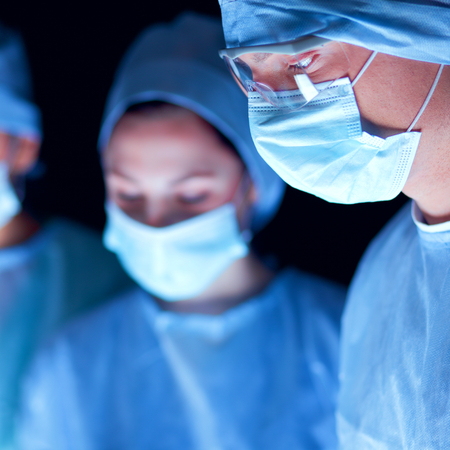 Team surgeon at work in operating roomの写真素材