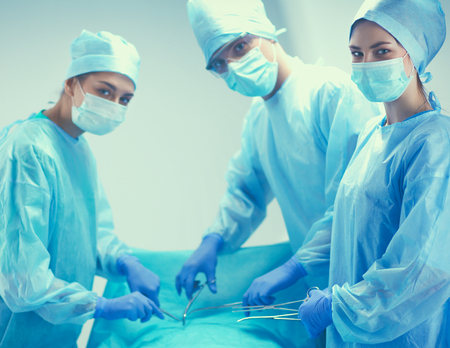 Team surgeon at work in operating roomの写真素材