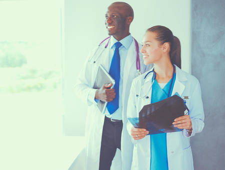 Doctors analyzing an x-ray in a mettingの写真素材