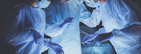 Team surgeon at work in operating room.の写真素材