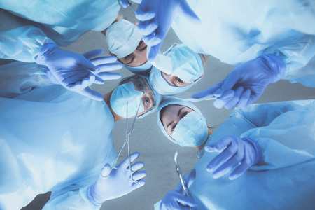 Team surgeon at work in operating room.の写真素材