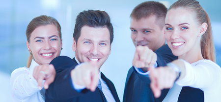 Group of business people pointing to youの写真素材