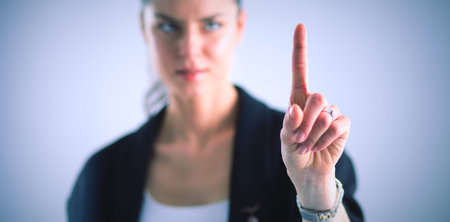 Woman touching an imaginary screen with her finger