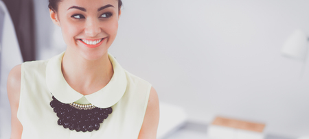 Modern young fashion designer working at studioの写真素材