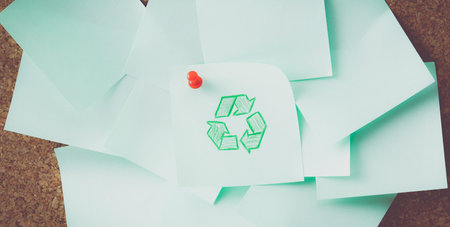 Cork board with notes, recycle signの写真素材