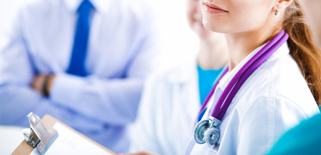 Attractive female doctor in front of medical group .の写真素材