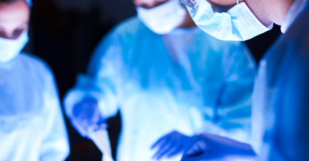 Team surgeon at work in operating room.の写真素材