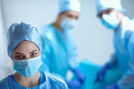 Team surgeon at work in operating roomの写真素材